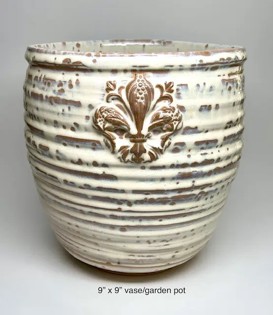 Image of a white and brown Planter