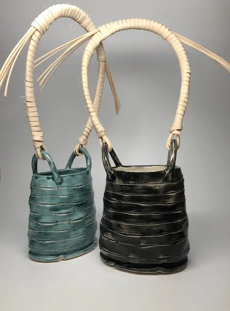 teal and black ceramic baskets
